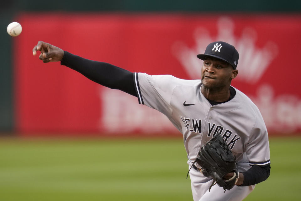 New York Yankees pitcher Domingo Germán throws to an Oakland Athletics batter during the first inning of a baseball game in Oakland, Calif., Wednesday, June 28, 2023. (AP Photo/Godofredo A. Vásquez)