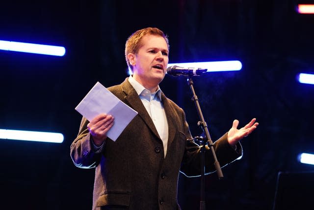 Minister for Immigration Robert Jenrick speaks at the rally 