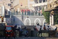 Demonstrators take part during the ongoing anti-government protests in Baghdad