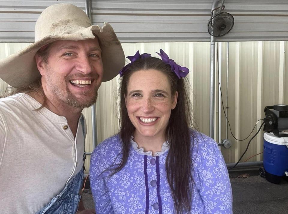 Larry Hoover and his wife Toni Hoover smile for a selfie at Silver Dollar City. Larry, known as "Shorty Hatfield" at Silver Dollar City, celebrated his 27th season at the park in 2023.