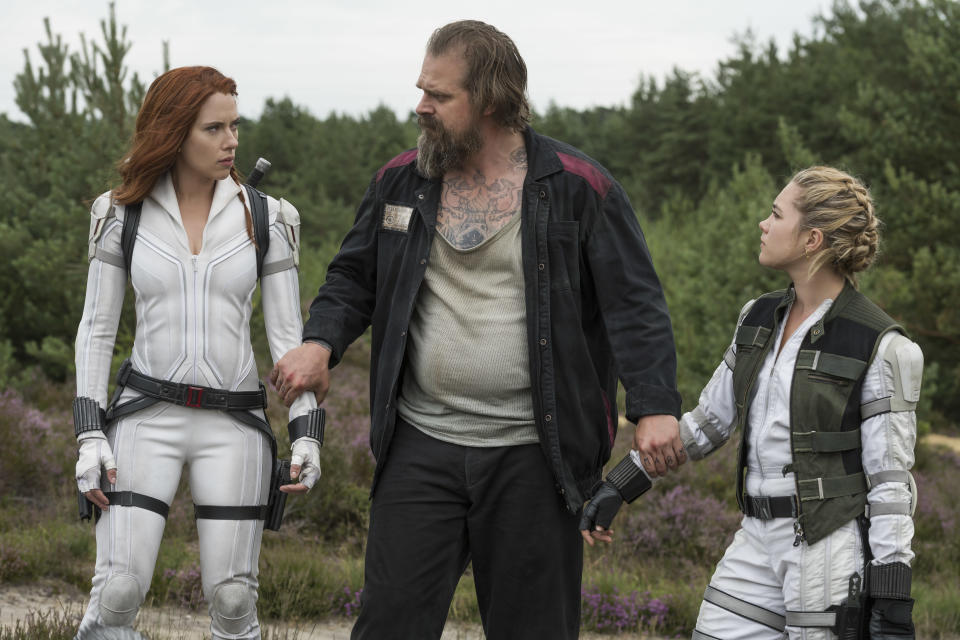 (L-R): Black Widow/Natasha Romanoff (Scarlett Johansson), Alexei (David Harbour) and Yelena (Florence Pugh) in Marvel Studios' BLACK WIDOW, in theaters and on Disney+ with Premier Access. (Photo by Jay Maidment/Marvel Studios)