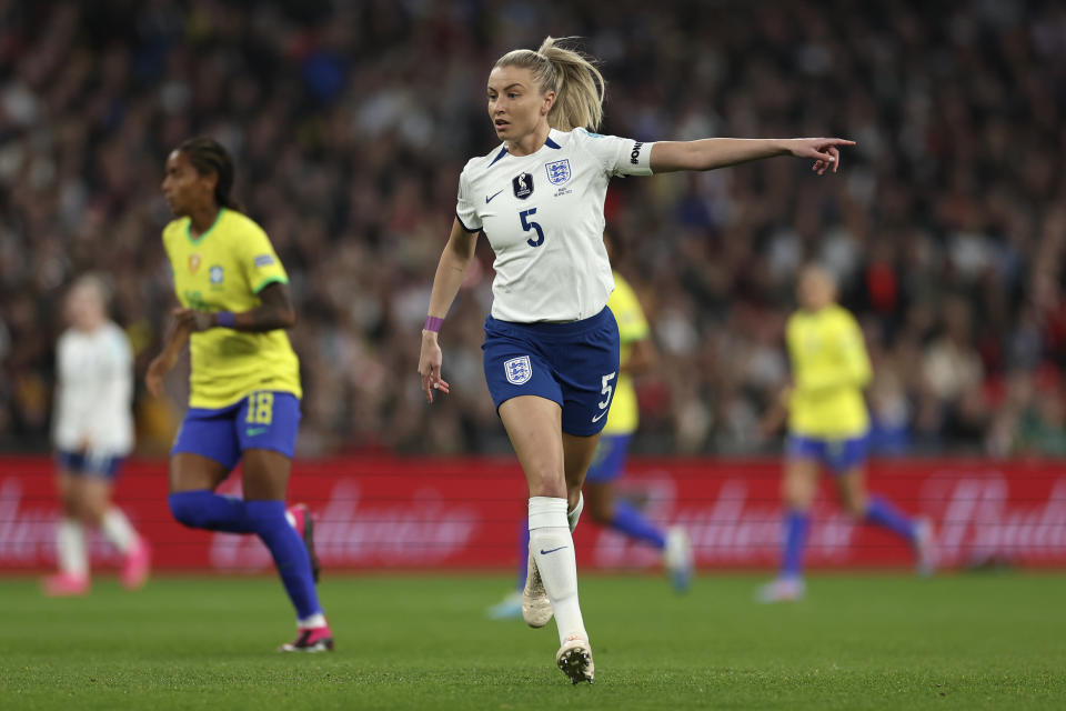 FILE - England's Leah Williamson gestures during the Women's Finalissima soccer match between England and Brazil at Wembley stadium in London, on April 6, 2023. Williamson will miss the Women's World Cup because of a torn knee ligament. Arsenal confirmed Friday April 21, 2023 that Williamson "suffered a ruptured anterior cruciate ligament" and will need surgery. (AP Photo/Ian Walton, File)