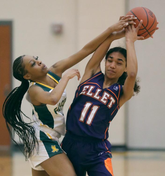 Firestone&#39;s Ayana Smith pressures Ellet&#39;s Trinity Brown during the fourth quarter of Thursday night&#39;s City Series game. Ellet won 61-21. [Phil Masturzo/Beacon Journal]