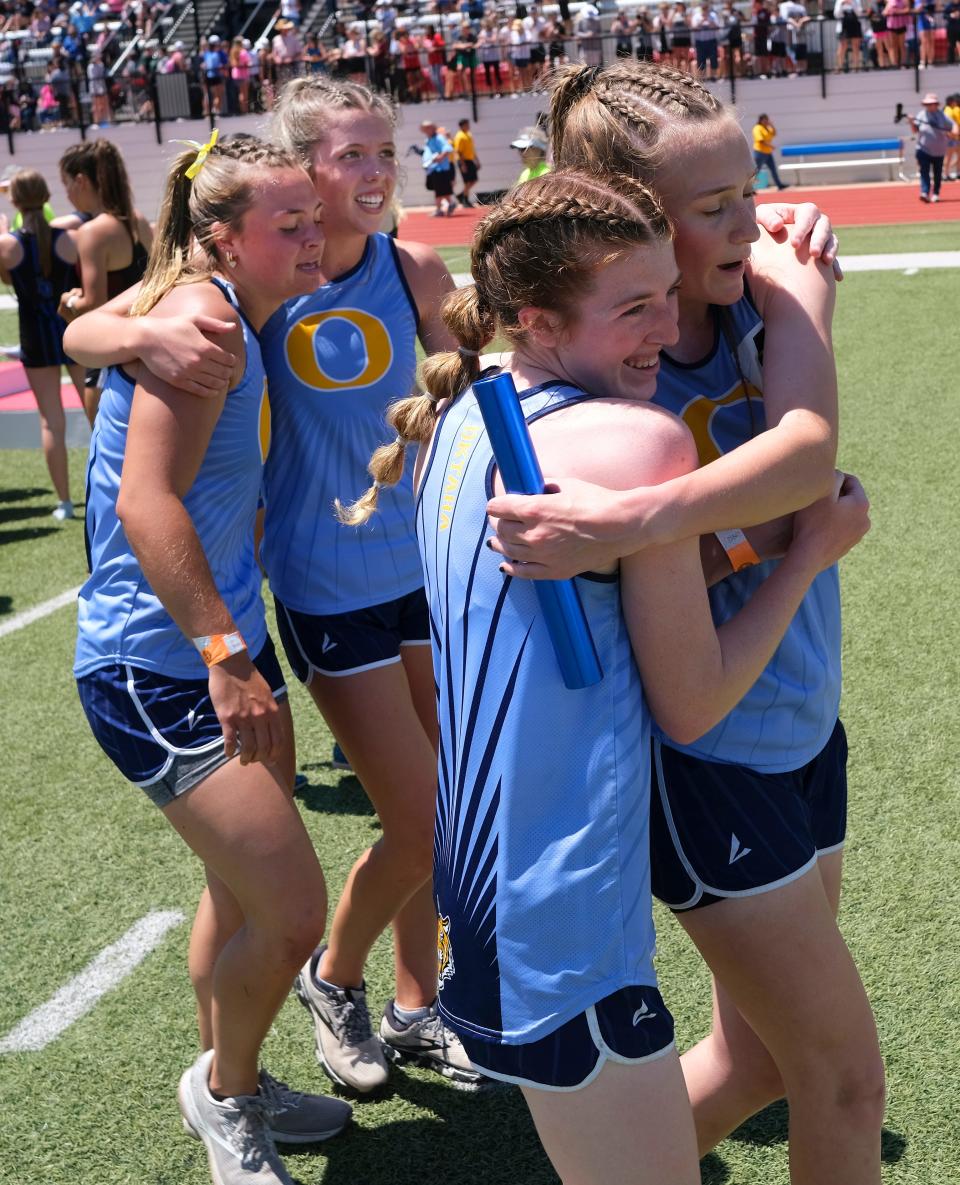 The Oktaha girls 2A 4x800 relay team celebrate their victory at the 1A/2A track and field state championships at Western Heights high school Friday , May 5, 2023.