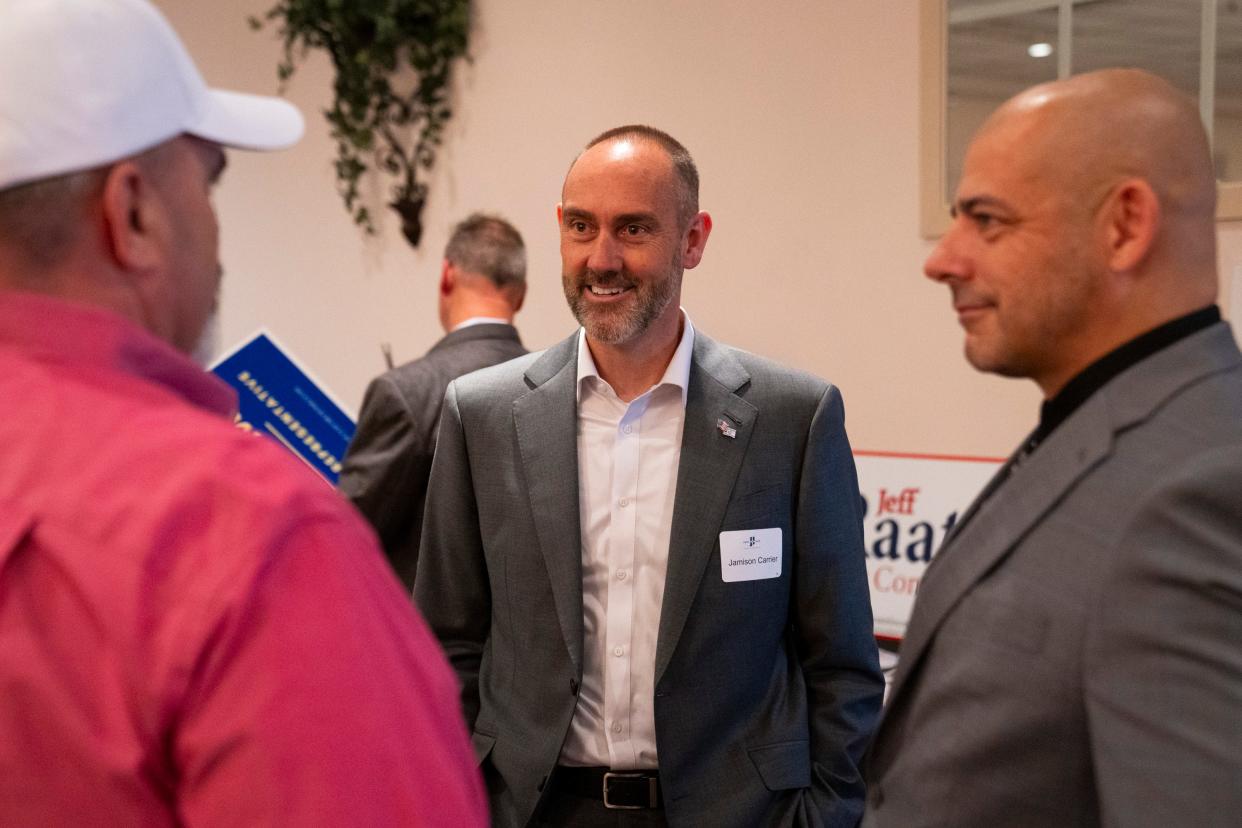 Jamison Carrier, a republican candidate running for congress in Indiana’s 6th Congressional District, talks with attendees of the Perry Township Lincoln Day dinner on Tuesday, April 2, 2024, at The Atrium in Indianapolis.