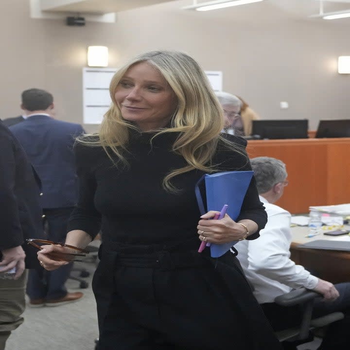 Paltrow showed up to court wearing all black with her Smythson notebook.