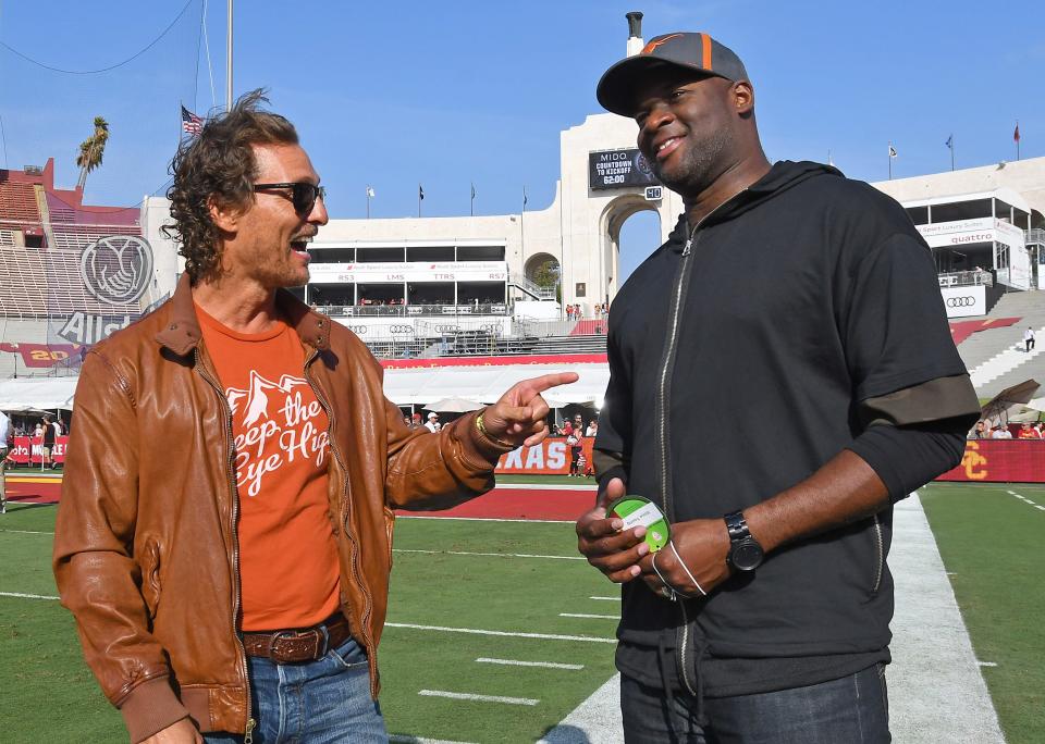 Actor Matthew McConaughey and former Texas Longhorns quarterback Vince Young before a 2017 game against USC.