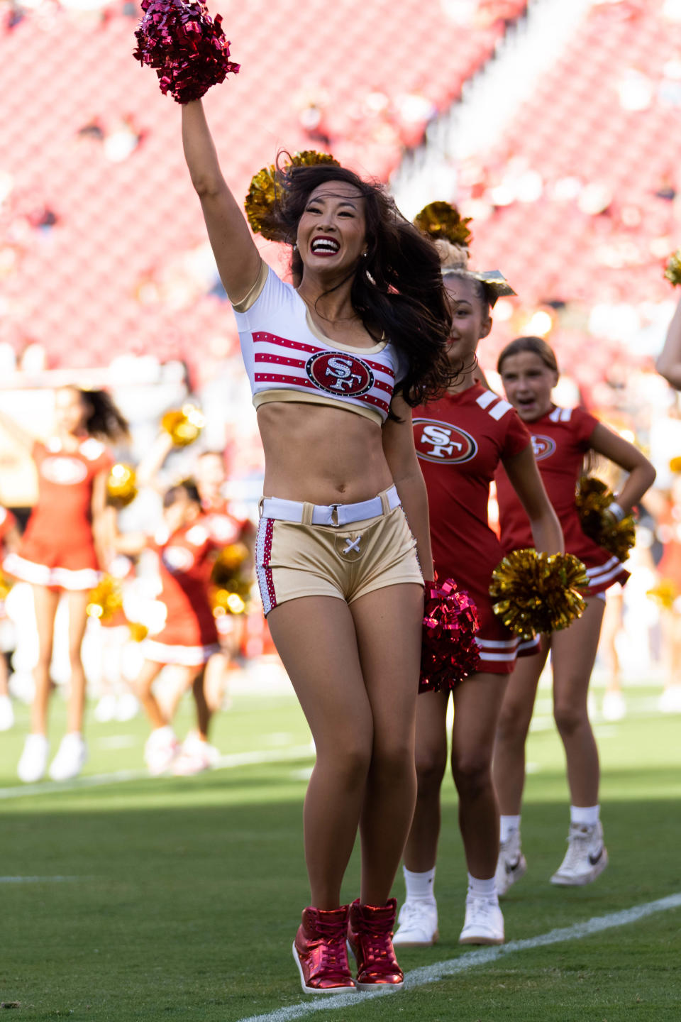Aug 19, 2023; Santa Clara, California, USA; San Francisco 49ers cheerleader perform for fans before the start of the first quarter against the Denver Broncos at Levi’s Stadium. Mandatory Credit: Stan Szeto-USA TODAY Sports