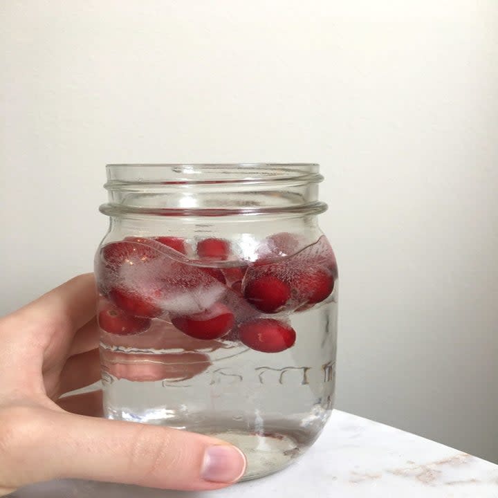 Worth noting: We liked these best when they had 5 or 6 cranberries in them, but the cubes with just 2 or 3 took longer to melt. Oh, and they did eventually turn the water a light pink, but we don't mind a little cranberry ~infusion~.