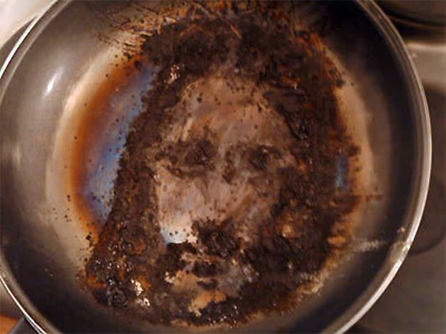 GALLERY: Holy apparitions - There's no doubt about it, this filthy frying pan bares a striking resemblance to Jesus.