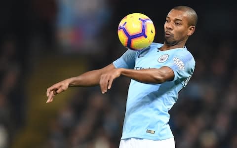 Fernandinho controls the ball on his chest - Credit: afp