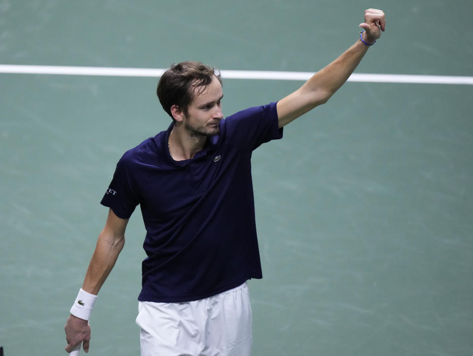 Russian Tennis Federation's Daniil Medvedev celebrates after beating Croatia's Marin Cilic to win the Davis Cup tennis final at the Madrid Arena in Madrid, Spain, Sunday, Dec. 5, 2021. (AP Photo/Manu Fernandez)