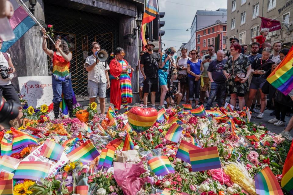 Flowers were left outside venues where a shooter is suspected to have opened fire (EPA)