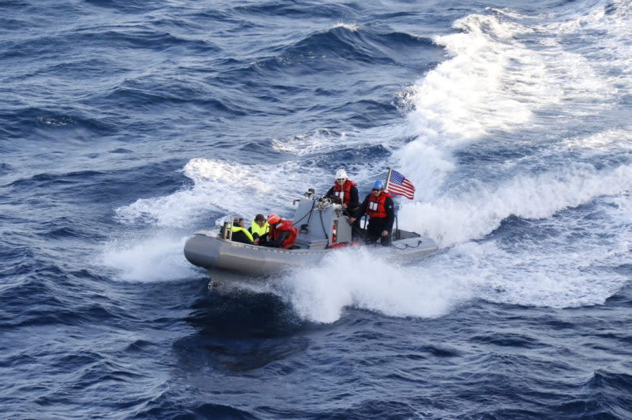 The Arleigh Burke-class guided missile destroyer USS Curtis Wilbur (DDG 54) responded to a distress call from two boaters stranded off the coast of San Diego, March 4.