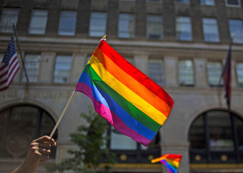 pride flag waving in the air