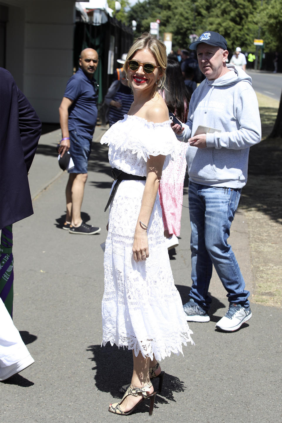 Wimbledon regular Sienna Miller enjoyed the sunshine on day seven of the tennis tournament. (Getty Images)