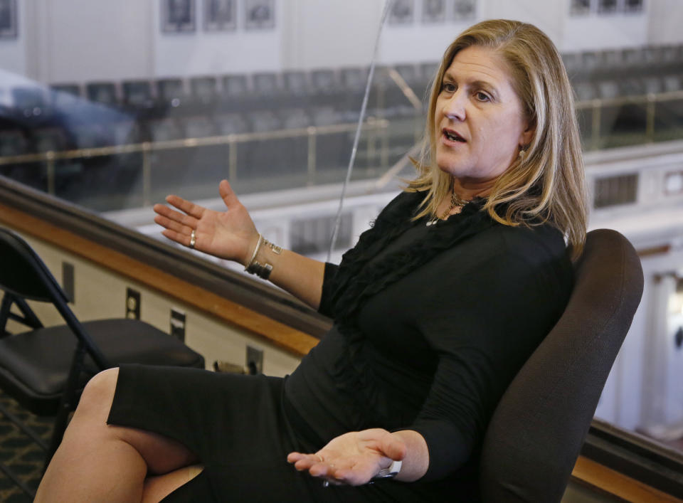 FILE - In this April 10, 2017, file photo, Trust Women's founder and CEO Julie Burkhart is pictured during an interview at the state Capitol in Oklahoma City. The Oklahoma City abortion clinic filed a lawsuit Friday, Nov. 8, 2019, challenging longstanding state laws that allow only physicians to perform abortions in Oklahoma, marking the sixth time in the past five years that the state's abortion restrictions have ended up in court. The lawsuit, which was filed on behalf of the Trust Women clinic, contends that such laws are unconstitutional because they restrict women's access to abortion without any valid medical basis. (AP Photo/Sue Ogrocki, File)