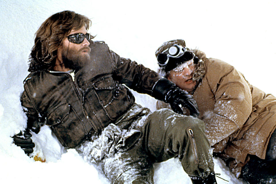 Kurt Russell lying in the snow