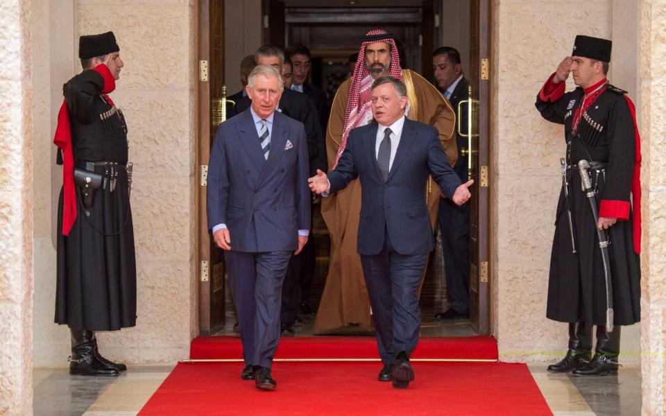 The Prince of Wales is greeted by Jordan's King Abdullah II at Al Husseinieh Palace, Amman, in 2015 - Arthur Edwards/The Sun/PA Wire