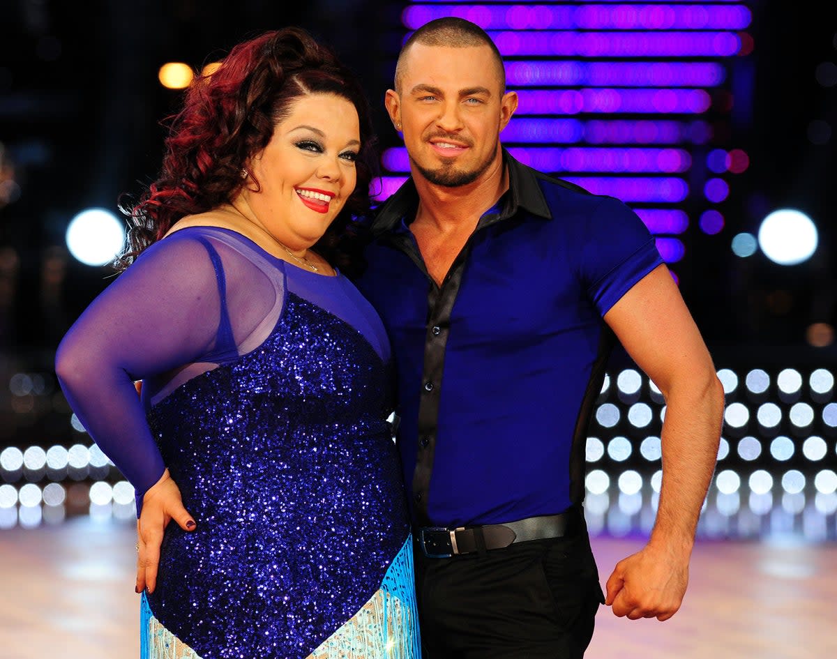 Robin Windsor, who has died aged 44, with actress Lisa Riley on Strictly Come Dancing  (PA)