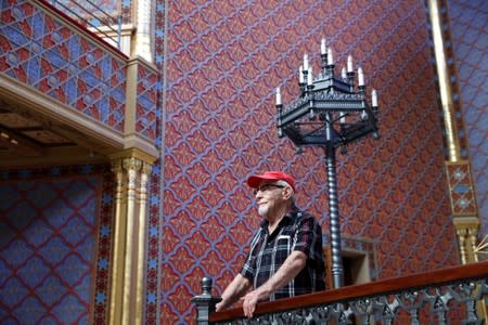 Tamas Irsai, 89, stands in the renovated Rumbach street synagogue in Budapest