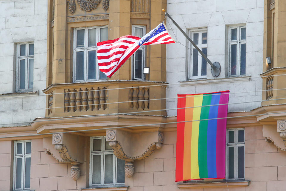 Image: The U.S. national flag and an LGBT pride flag hoisted on the front facade of the U.S. Embassy in Moscow. (Valery Sharifulin / Valery Sharifulin/TASS)