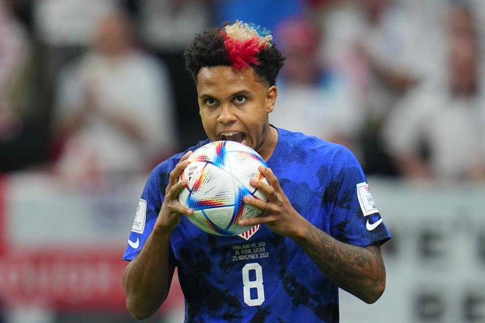 Weston McKennie of the United States reacts with the ball during the World Cup group B football match between England and The United States, at the Al Bayt Stadium in Al Khor , Qatar, Friday, Nov. 25, 2022. (AP Photo/Julio Cortez)