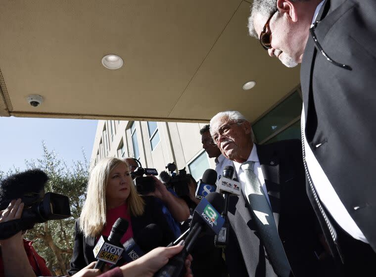 Ruben Flores speaks to the media outside a Salinas, Calif., court after being acquitted of accessory to murder, Tuesday, Oct. 18, 2022. Ruben's son Paul Flores was found guilty of murder in the killing of missing Cal Poly student Kristin Smart. (Daniel Dreifuss/Monterey Weekly via AP)
