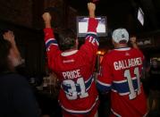 Montreal Canadiens hockey fans react as they watch the second away game of the Stanley Cup Finals