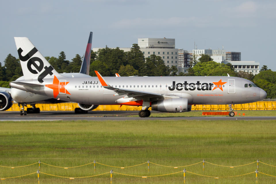 Photo of a Jetstar plane after one was praised for allowing the little turtle to make its way to safety at Gold Coast Airport.