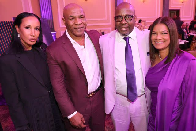 <p>Arnold Turner/Getty</p> Lakiha Spicer, Mike Tyson, Bobby and Alicia Etheredge-Brown on March 4 at the Bobbi Kristina Serenity House 4th Annual Gala