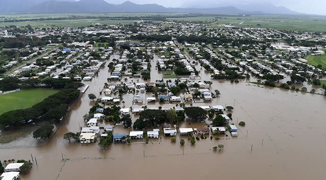 Houses are inundated with flood waters in Ingham in North Queensland, Sunday, March 11. Source: AAP