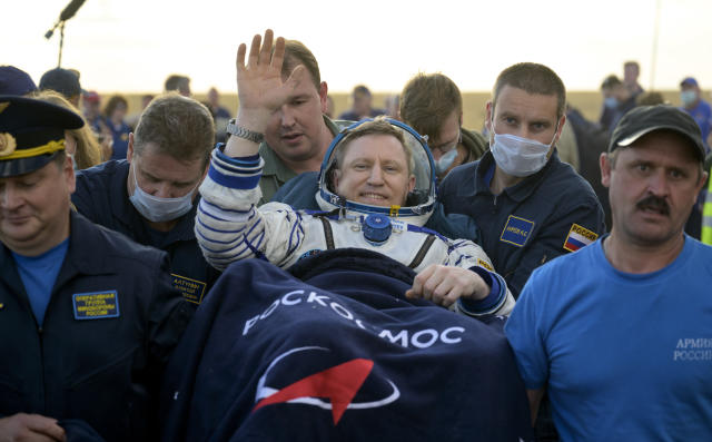 Three astronauts return to Earth after a year in space. NASA's