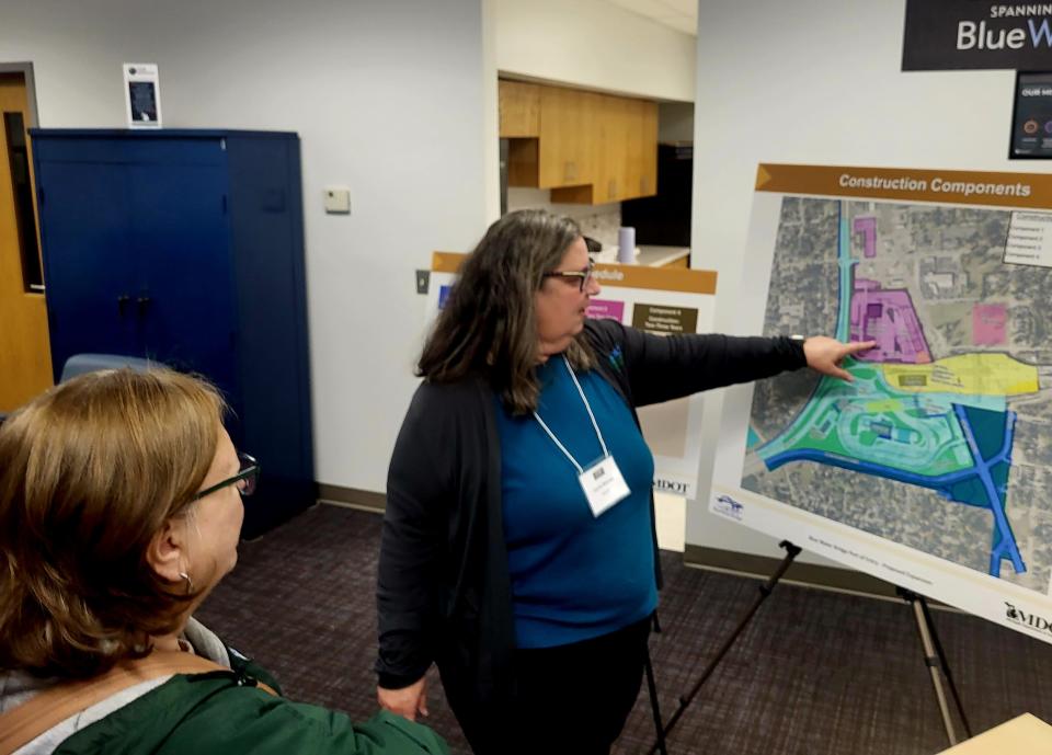 Carrie Warren, senior project manager for MDOT's U.S. Customs Plaza expansion at the Blue Water Bridge, points to a map of the footprint during an open house on Monday, Nov. 13, 2023.