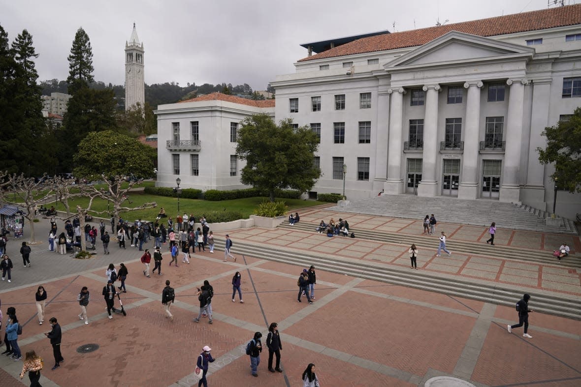 Students walk through Sproul Plaza on the University of California, Berkeley campus on March 29, 2022, in Berkeley, Calif. (AP Photo/Eric Risberg, File)