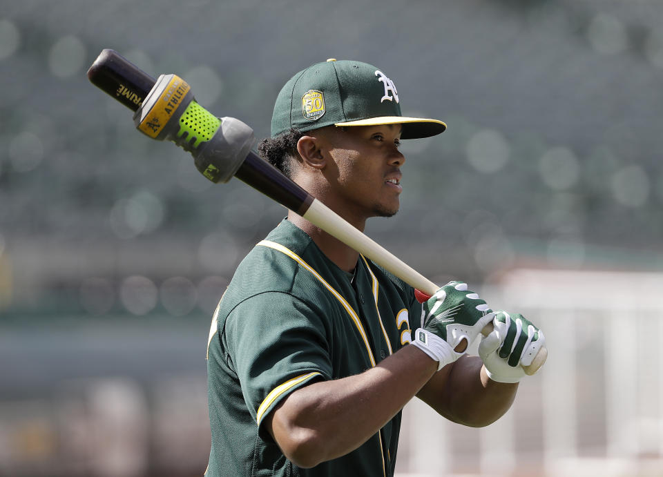If Kyler Murray doesn’t declare for the NFL draft, he’s expected to report to the A’s in February. (AP)