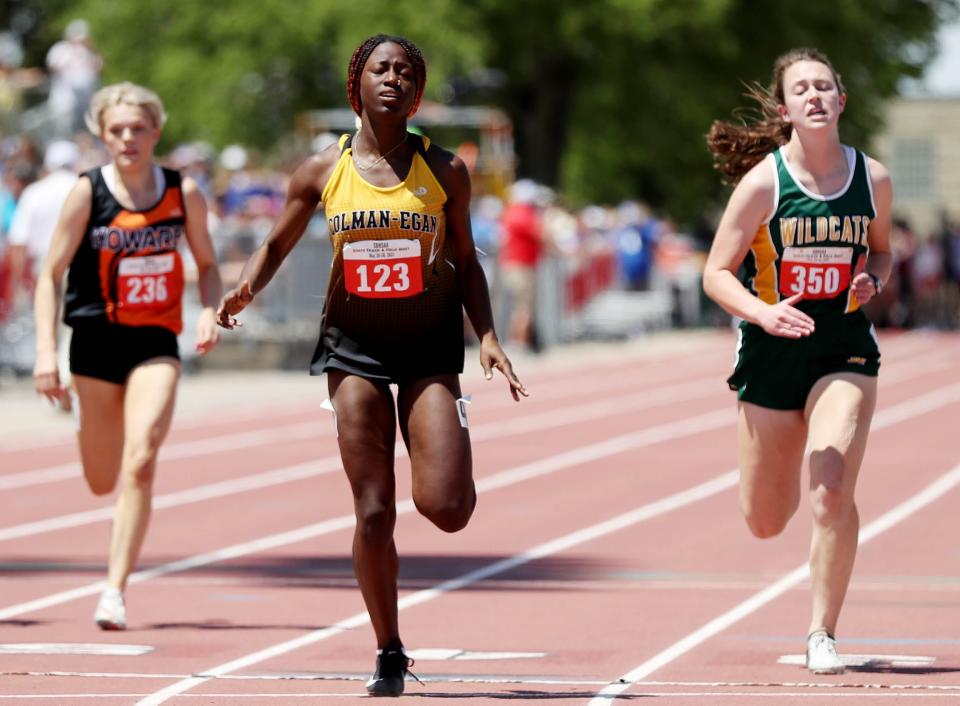 Colman-Egan's Daniela Lee (123) win the Class B girls' 100-meter dash during the 2022 South Dakota State Track and Field Championships at Howard Wood Field in Sioux Falls.