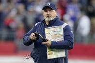 Dallas Cowboys head coach Mike McCarthy looks at the scoreboard during the first half of an NFL football game against the New England Patriots, Sunday, Oct. 17, 2021, in Foxborough, Mass. (AP Photo/Steven Senne)