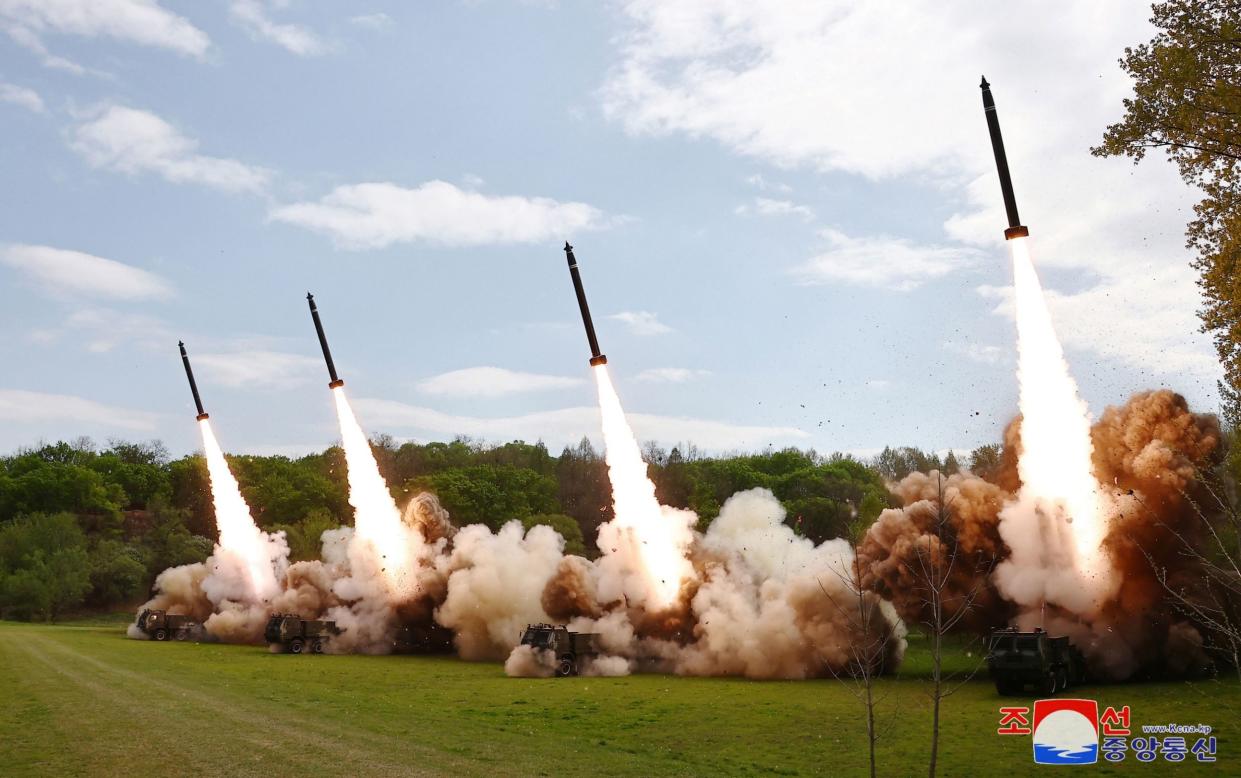 North Korean missiles are launched during a simulated nuclear counter-attack in April