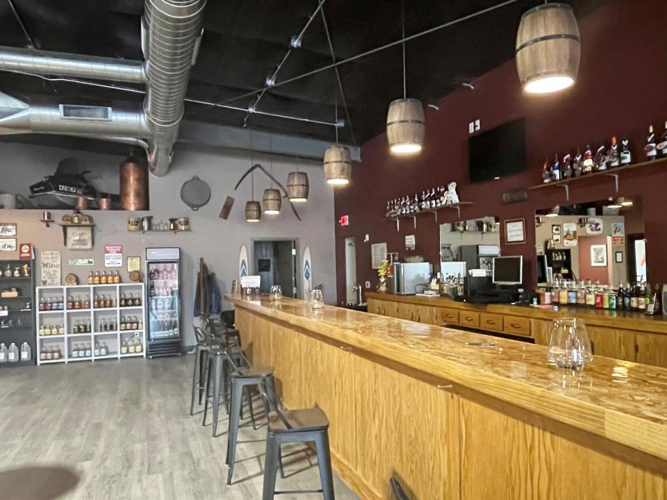Duck Creek Vineyard & Winery in the town of New Denmark has opened a new tasting room with more space, overhead glass garage doors for indoor/outdoor seating and, already a favorite of visitors, barrel light fixtures.