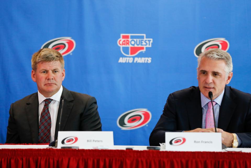 New Carolina Hurricanes head coach Bill Peters and Hurricanes general manager Ron Francis speak to the media during a press conference at PNC Arena in Raleigh, N.C., Friday, June 20, 2014. (Jill Knight/Raleigh News &amp; Observer/Tribune News Service via Getty Images)