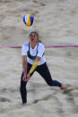 LONDON, ENGLAND - JULY 28: Nat Cook of Australia dives for the ball against the United States during the Women's Beach Volleyball Preliminary Round on Day 1 of the London 2012 Olympic Games at Horse Guards Parade on July 28, 2012 in London, England. (Photo by Ryan Pierse/Getty Images)