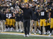 Iowa offensive coordinator Brian Ferentz signals to his team in the first half against Rutgers during an NCAA college football game, Saturday, Nov. 11, 2023, in Iowa City, Iowa. (AP Photo/Bryon Houlgrave)