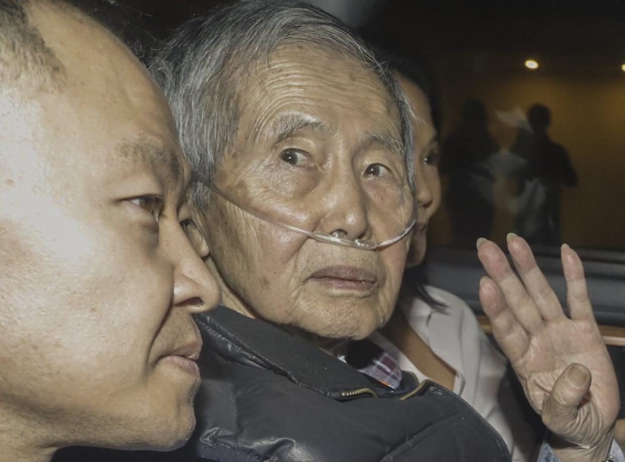 A frail but free Alberto Fujimori. <a href="https://www.gettyimages.com/detail/news-photo/former-perus-president-alberto-fujimori-sits-between-his-news-photo/1829282546?adppopup=true" rel="nofollow noopener" target="_blank" data-ylk="slk:Renato Pajuelo/AFP via Getty Images;elm:context_link;itc:0;sec:content-canvas" class="link ">Renato Pajuelo/AFP via Getty Images</a>