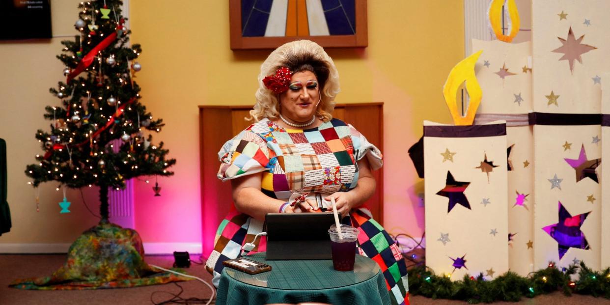 Momma Ashley Rose calls out winning bingo numbers during the Bingo with Momma and Friends event held at the Unitarian Universalist Congregation of Lakeland in Lakeland, Florida, U.S. December 15, 2022.