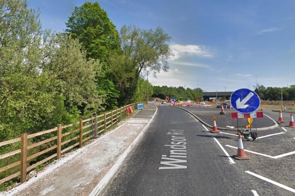 Man dies as tree falls on car in Egham, Surrey, while four others are injured