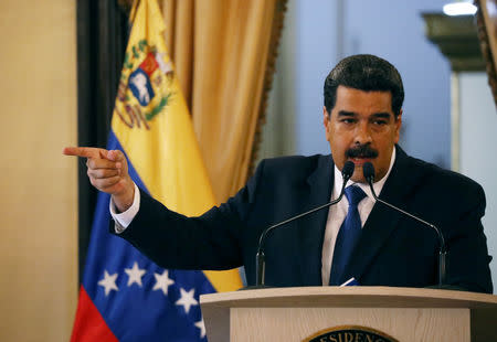 Venezuela's President Nicolas Maduro gestures during a news conference at Miraflores Palace in Caracas, Venezuela, February 8, 2019. REUTERS/Andres Martinez Casares/Files