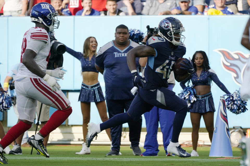 Tennessee Titans running back Dontrell Hilliard (40) runs to the end zone for a touchdown after making a catch during the second half of an NFL football game againt the New York Giants Sunday, Sept. 11, 2022, in Nashville. (AP Photo/Mark Humphrey)