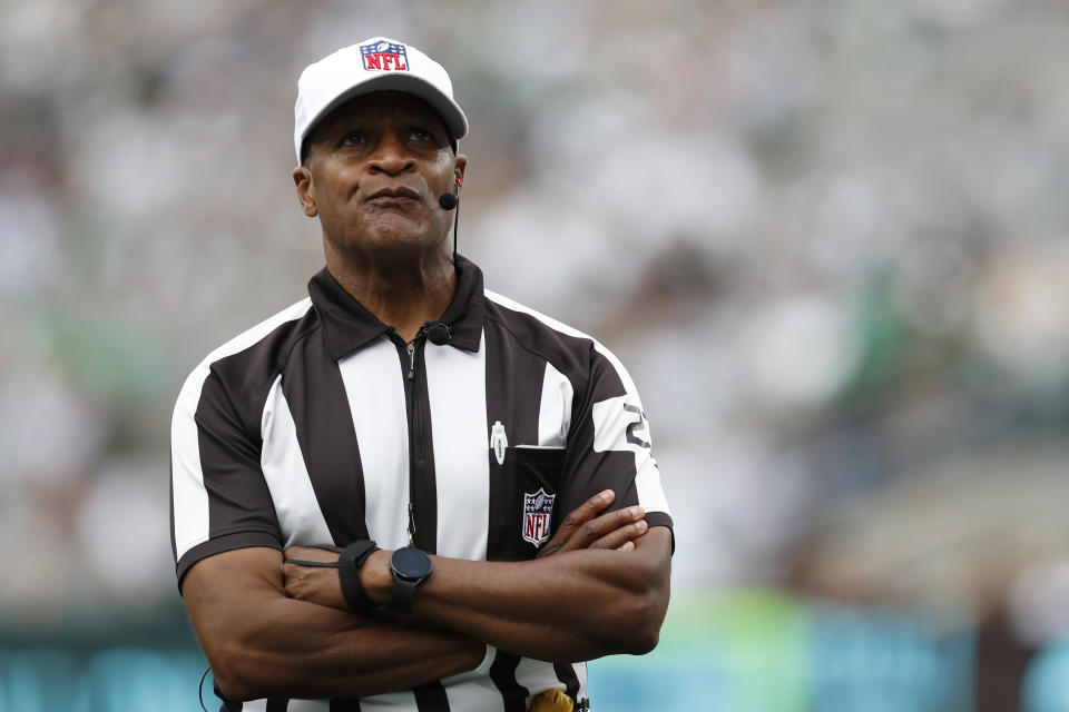 Referee Jerome Boger looks on during an NFL football game between the New York Jets and the Cincinnati Bengals, Sunday, Sept. 25, 2022, in East Rutherford, N.J. The Cincinnati Bengals won 27-12. (AP Photo/Steve Luciano)