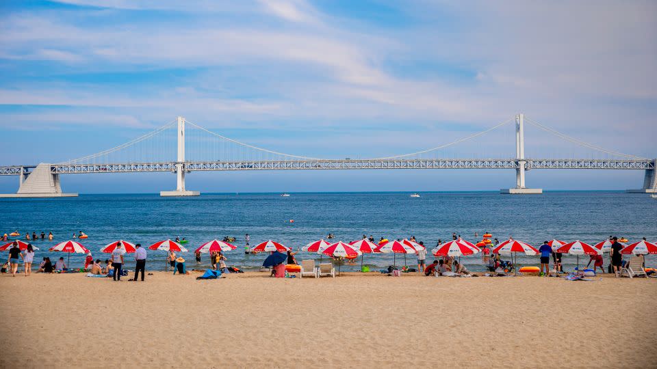 Gwangalli Beach offers great views of Busan’s iconic Gwangan Diamond Bridge. - Visit Busan